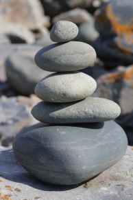 balance balancing boulder close up